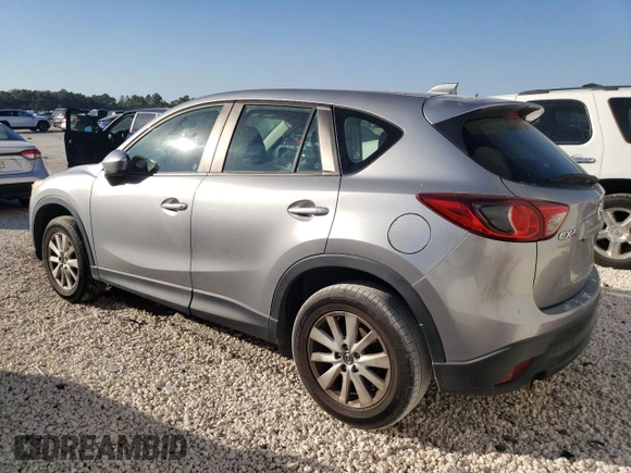 2014 Mazda CX-5 Sport with VIN JM3KE2BE1E0332932, listed as a Copart auction lot 42690515 with 93,420 mi miles and Clean Title. Bid and sale history available at carsss.com. Image 2.