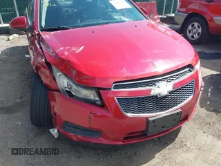 2014 Chevrolet Cruze 2LT z VIN 1G1PE5SB2E7123236, wystawiony jako IAAI lot #41882768 z przebiegiem 123 311 mil mil oraz . Historia ofert i sprzedaży dostępna na DreamBid. Obrazek 6.