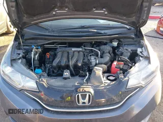 2015 Honda Fit EX-L with VIN 3HGGK5H85FM755006, listed as a IAAI auction lot 41034606 with 97,294 mi miles and . Bid and sale history available at DreamBid. Image 10.