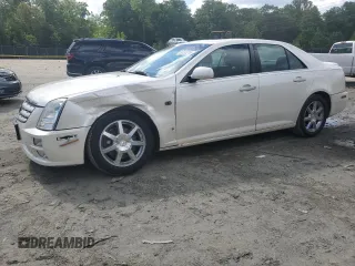 2006 Cadillac STS z VIN 1G6DW677760113123, wystawiony jako Copart lot #58151215 z przebiegiem 154 597 mil mil oraz Szkoda całkowita • Salvage title. Historia ofert i sprzedaży dostępna na DreamBid. Obrazek 1.