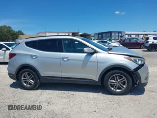 2017 Hyundai Santa Fe 2.4L with VIN 5XYZU3LB7HG407524, listed as a IAAI auction lot 42580597 with 117,311 mi miles and . Bid and sale history available at DreamBid. Image 12.
