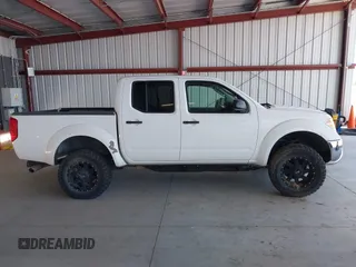 2006 Nissan Frontier SE z VIN 1N6AD07U06C469157, wystawiony jako IAAI lot #42249320 z przebiegiem 189 936 mil mil oraz . Historia ofert i sprzedaży dostępna na DreamBid. Obrazek 13.