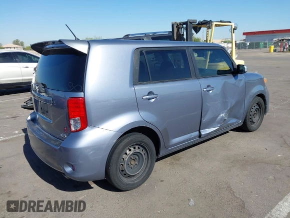 2012 Scion xB with VIN JTLZE4FE0CJ029259, listed as a IAAI auction lot 42272635 with 211,235 mi miles and . Bid and sale history available at DreamBid. Image 4.