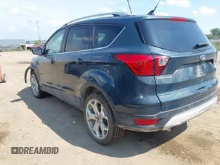 2019 Ford Escape Titanium with VIN 1FMCU9J99KUC00935, listed as a IAAI auction lot 42583250 with 91,241 mi miles and . Bid and sale history available at DreamBid. Image 3.