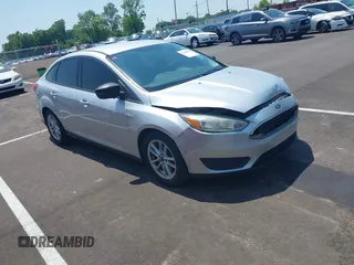 2015 Ford Focus SE z VIN 1FADP3F21FL362486, wystawiony jako IAAI lot #42460834 z przebiegiem 343 619 mil mil oraz . Historia ofert i sprzedaży dostępna na DreamBid. Obrazek 1.