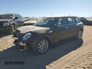 2017 MINI Clubman Cooper S with VIN WMWLU5C56H2E82186, listed as a Copart auction lot 83994644 with 71,363 mi miles and Salvage Title. Bid and sale history available at carsss.com. Image 1.