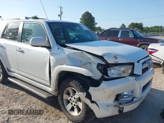 2011 Toyota 4Runner SR5 with VIN JTEZU5JR2B5014781, listed as a IAAI auction lot 42231932 with 124,646 mi miles and . Bid and sale history available at DreamBid. Image 6.