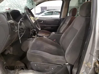 2007 GMC Envoy SLE z VIN 1GKDT13S172300399, wystawiony jako Copart lot #56978495 z przebiegiem 239 862 mil mil oraz Nie do naprawy. Historia ofert i sprzedaży dostępna na DreamBid. Obrazek 7.