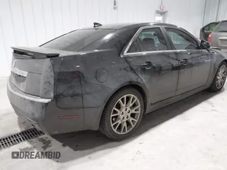 2013 Cadillac CTS Premium z VIN 1G6DS5E34D0103328, wystawiony jako IAAI lot #41501406 z przebiegiem 157 633 mil mil oraz . Historia ofert i sprzedaży dostępna na DreamBid. Obrazek 4.