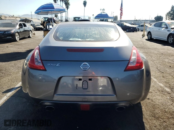 2016 Nissan 370Z with VIN JN1AZ4EH3GM933820, listed as a Copart auction lot 69776164 with 0 mi miles and Salvage Title. Bid and sale history available at carsss.com. Image 6.