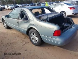 1997 Ford Thunderbird LX with VIN 1FALP6242VH127682, listed as a IAAI auction lot 41088946 with 88,769 mi miles and . Bid and sale history available at DreamBid. Image 3.