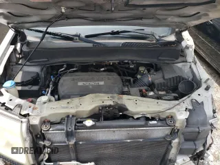 2009 Honda Pilot LX with VIN 5FNYF48259B040040, listed as a Copart auction lot 59860445 with 213,459 mi miles and Salvage title. Bid and sale history available at DreamBid. Image 12.