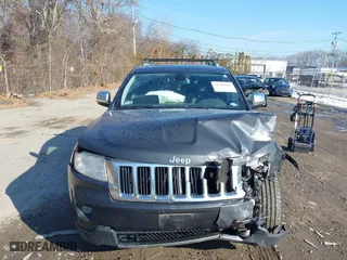 2011 Jeep Grand Cherokee Limited with VIN 1J4RR5GG4BC604756, listed as a IAAI auction lot 41399151 with 160,153 mi miles. Bid and sale history available at carsss.com. Image 12.