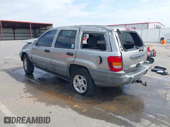 2000 Jeep Grand Cherokee Laredo with VIN 1J4GW48N5YC322707, listed as a IAAI auction lot 42080677 with Not provided miles and . Bid and sale history available at DreamBid. Image 3.