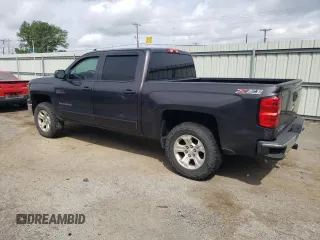 2015 Chevrolet Silverado 1500 LT with VIN 3GCUKREC0FG509688, listed as a Copart auction lot 54199185 with 0 mi miles and Salvage Title. Bid and sale history available at carsss.com. Image 2.