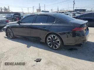 2024 BMW 5 Series 530i z VIN WBA43FJ08RCS17556, wystawiony jako Copart lot #48853495 z przebiegiem 4 151 mil mil oraz Szkoda całkowita • Salvage title. Historia ofert i sprzedaży dostępna na DreamBid. Obrazek 2.