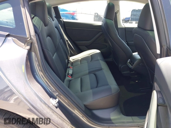 2023 Tesla Model 3 z VIN 5YJ3E1EA6PF694419, wystawiony jako IAAI lot #42268637 z przebiegiem 17 419 mil mil oraz . Historia ofert i sprzedaży dostępna na DreamBid. Obrazek 8.
