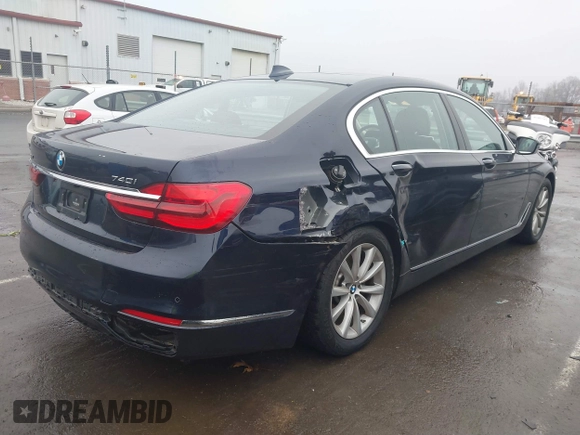 2019 BMW 7 Series 740i xDrive with VIN WBA7E4C52KGV70359, listed as a IAAI auction lot 41421504 with 55,734 mi miles and . Bid and sale history available at carsss.com. Image 4.