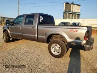 2010 Ford Super Duty F-250 SRW XL with VIN 1FTSW2BR7AEA73658, listed as a Copart auction lot 66893704 with 169,714 mi miles and Salvage Title. Bid and sale history available at carsss.com. Image 2.