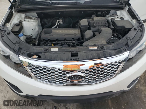 2012 Kia Sorento LX with VIN 5XYKT3A19CG219658, listed as a Copart auction lot 54078185 with 102,699 mi miles and Salvage Title. Bid and sale history available at DreamBid. Image 12.