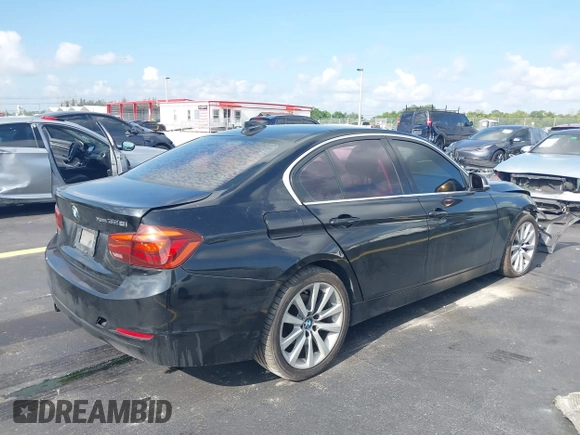 2013 BMW 3 Series 328i xDrive with VIN WBA3B3C59DJ810112, listed as a IAAI auction lot 42457122 with 117,568 mi miles and . Bid and sale history available at DreamBid. Image 4.