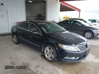 2013 Volkswagen CC Sport with VIN WVWBP7AN1DE506856, listed as a IAAI auction lot 42111392 with 172,706 mi miles. Bid and sale history available at carsss.com. Image 1.