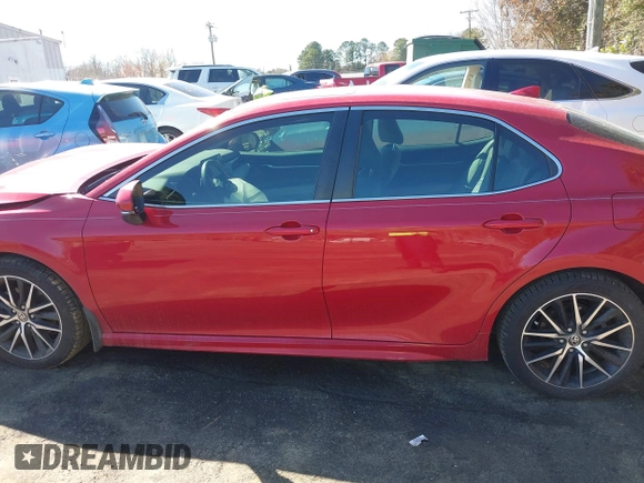 2021 Toyota Camry SE Nightshade with VIN 4T1G11AK1MU405019, listed as a IAAI auction lot 41822878 with 52,174 mi miles and . Bid and sale history available at DreamBid. Image 14.