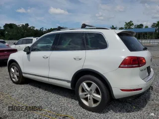 2013 Volkswagen Touareg z VIN WVGEG9BP7DD001849, wystawiony jako Copart lot #60208005 z przebiegiem 120 741 mil mil oraz Czysty tytuł • Clean title. Historia ofert i sprzedaży dostępna na DreamBid. Obrazek 2.