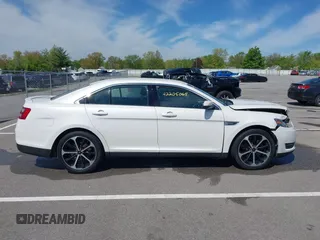2016 Ford Taurus SEL with VIN 1FAHP2E88GG131659, listed as a IAAI auction lot 42205065 with 99,416 mi miles and . Bid and sale history available at DreamBid. Image 13.