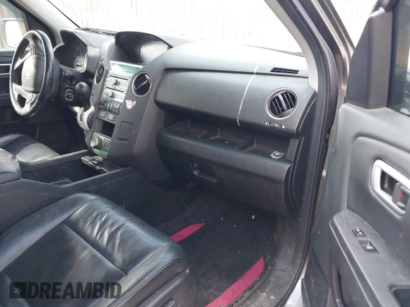 2011 Honda Pilot Touring with VIN 5FNYF4H98BB016012, listed as a IAAI auction lot 41634844 with 202,160 mi miles. Bid and sale history available at carsss.com. Image 5.