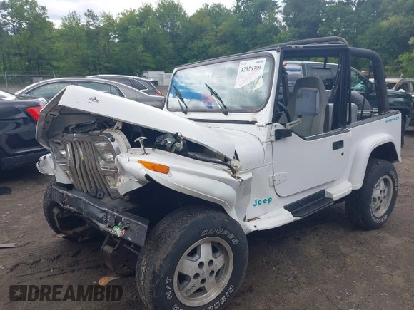 1995 Jeep Wrangler z VIN 1J4FY29S1SP206760, wystawiony jako IAAI lot #42326399 z przebiegiem 55 278 mil mil oraz . Historia ofert i sprzedaży dostępna na DreamBid. Obrazek 2.