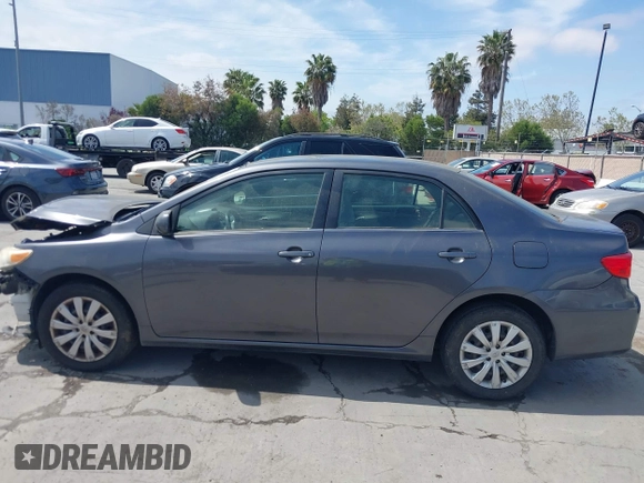 2013 Toyota Corolla L with VIN JTDBU4EE2DJ113876, listed as a IAAI auction lot 42044548 with 232,500 mi miles. Bid and sale history available at carsss.com. Image 15.