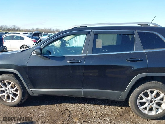2014 Jeep Cherokee Latitude with VIN 1C4PJMCS2EW124467, listed as a IAAI auction lot 41944747 with 132,890 mi miles. Bid and sale history available at carsss.com. Image 14.