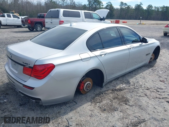 2011 BMW 7 Series 740i with VIN WBAKA4C59BC392365, listed as a IAAI auction lot 41618732 with 142,270 mi miles. Bid and sale history available at carsss.com. Image 4.