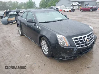 2013 Cadillac CTS Luxury z VIN 1G6DG5E50D0121280, wystawiony jako IAAI lot #42439031 z przebiegiem 75 211 mil mil oraz . Historia ofert i sprzedaży dostępna na DreamBid. Obrazek 1.