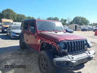 2021 Jeep Wrangler Unlimited Willys with VIN 1C4HJXDN1MW650554, listed as a IAAI auction lot 40619885 with 36,167 mi miles and . Bid and sale history available at DreamBid. Image 1.