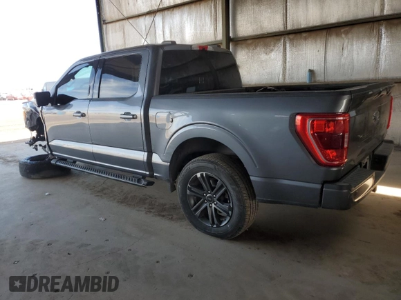 2021 Ford F-150 XL with VIN 1FTEW1C58MFB54623, listed as a Copart auction lot 55072405 with 115,374 mi miles and Salvage title. Bid and sale history available at DreamBid. Image 2.