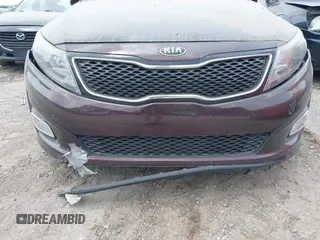 2014 Kia Optima EX z VIN 5XXGN4A77EG338455, wystawiony jako IAAI lot #42071765 z przebiegiem 136 331 mil mil oraz . Historia ofert i sprzedaży dostępna na DreamBid. Obrazek 17.