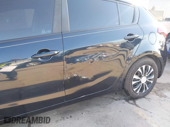 2017 Kia Forte5 LX with VIN KNAFK5A80H5696912, listed as a IAAI auction lot 41963104 with 97,009 mi miles. Bid and sale history available at carsss.com. Image 6.