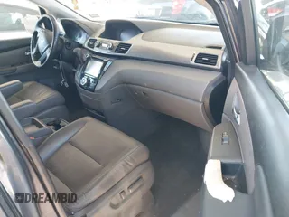 2015 Honda Odyssey EX-L z VIN 5FNRL5H68FB025338, wystawiony jako IAAI lot #41760096 z przebiegiem 181 252 mil mil oraz . Historia ofert i sprzedaży dostępna na DreamBid. Obrazek 5.