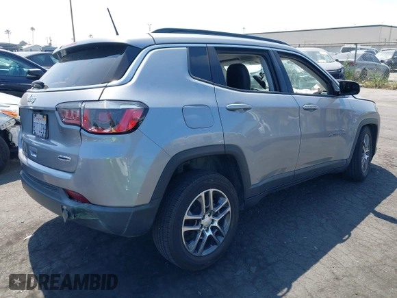 2018 Jeep Compass Latitude with VIN 3C4NJCBBXJT102753, listed as a IAAI auction lot 42379577 with 98,423 mi miles and . Bid and sale history available at DreamBid. Image 4.
