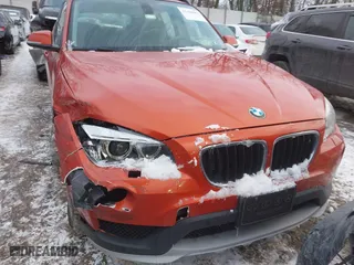 2015 BMW X1 xDrive28i with VIN WBAVL1C51FVY33650, listed as a IAAI auction lot 41400985 with 132,484 mi miles. Bid and sale history available at carsss.com. Image 12.
