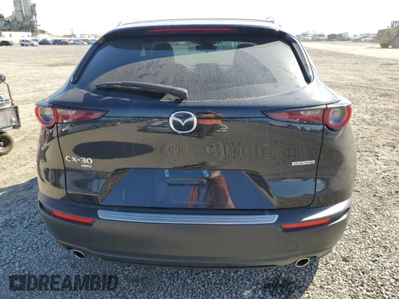 2023 Mazda CX-30 S Carbon Edition with VIN 3MVDMBCM8PM567157, listed as a Copart auction lot 46954865 with 20,038 mi miles and Salvage Title. Bid and sale history available at DreamBid. Image 6.