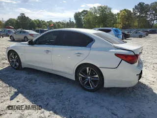 2015 Infiniti Q50 Premium z VIN JN1BV7AP4FM348063, wystawiony jako Copart lot #52712245 z przebiegiem 55 188 mil mil oraz Szkoda całkowita • Salvage title. Historia ofert i sprzedaży dostępna na DreamBid. Obrazek 2.