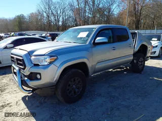 2023 Toyota Tacoma 4WD SR with VIN 3TMCZ5ANXPM609159, listed as a IAAI auction lot 41650165 with 14,987 mi miles. Bid and sale history available at carsss.com. Image 18.