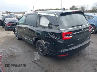 2023 Honda Odyssey Touring with VIN 5FNRL6H81PB068721, listed as a IAAI auction lot 41489618 with 20,202 mi miles and . Bid and sale history available at DreamBid. Image 3.