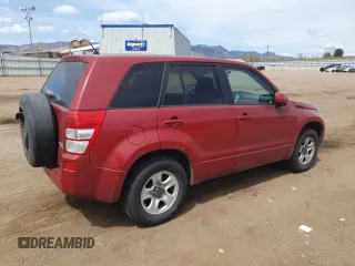 2012 Suzuki Grand Vitara Premium z VIN JS3TD0D20C4101342, wystawiony jako Copart lot #51956595 z przebiegiem 166 710 mil mil oraz Szkody całkowita. Historia ofert i sprzedaży dostępna na DreamBid. Obrazek 3.