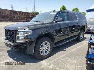 2020 Chevrolet Suburban LS with VIN 1GNSCGKC7LR281494, listed as a Copart auction lot 57772955 with 56,629 mi miles and Salvage title. Bid and sale history available at DreamBid. Image 1.