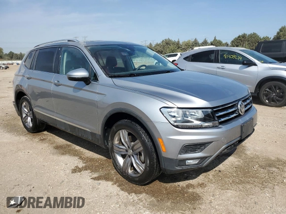 2021 Volkswagen Tiguan SE with VIN 3VV3B7AX8MM115493, listed as a Copart auction lot 71198794 with 34,958 mi miles and Salvage Title. Bid and sale history available at DreamBid. Image 4.