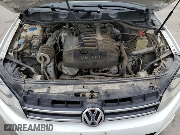 2013 Volkswagen Touareg Exec z VIN WVGEF9BP6DD001991, wystawiony jako Copart lot #58447175 z przebiegiem 170 264 mil mil oraz Czysty tytuł • Clean title. Historia ofert i sprzedaży dostępna na DreamBid. Obrazek 12.